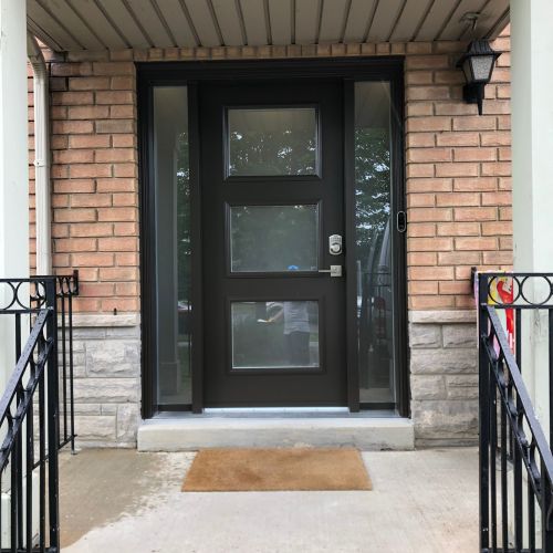 Modern front door with steps and a porch