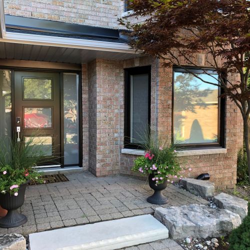Front entrance with modern planting design